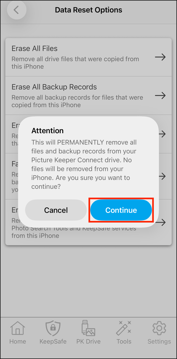 The Factory Reset prompt, Attention, with Continue highlighted
